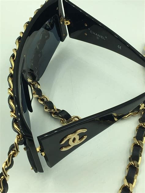 chanel black sunglasses with gold chain|oversized Chanel sunglasses.